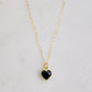 Black onyx heart pendant set on a 14k gold filled chain necklace.