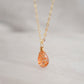 Orange Sunstone smooth polished teardrop pendant on a 14k gold filled chain. Stones shimmer in the light and when turned from side to side. 