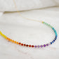 Close up of the gemstones in this beaded rainbow necklace made of natural crystal gemstones. The 14k gold filled style is shown. Handmade in New England by Gemnia.
