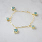 A handmade gold bracelet with blue Amazonite star-shaped charms on paperclip chain. Wear it solo or stack it with others. It makes the perfect gift for astrologists, astronomers, and star gazers.