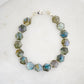 Beaded Labradorite gemstone bracelet shown in sterling silver. The stones are faceted and cut in a hexagonal shape.