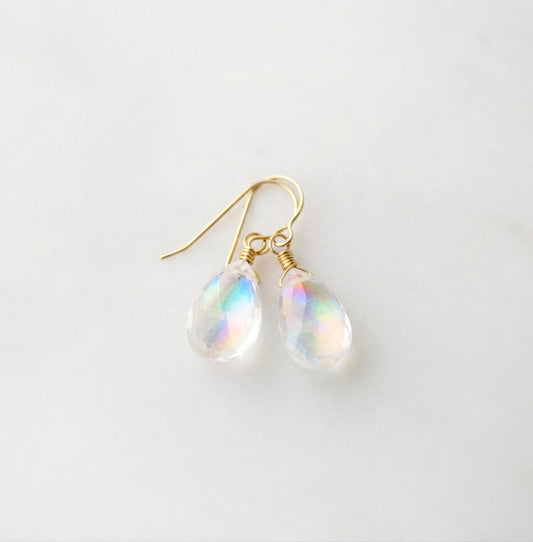 Genuine rainbow mystic topaz dangle earrings in 14k gold filled. The stones are clear, but flash rainbow colors when turned side to side. Also available in sterling silver. Handmade dainty gemstone jewelry by Gemnia.
