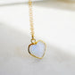 Natural handmade rainbow moonstone heart-shaped pendant necklace with 14k gold filled chain. Handmade in New England by Gemnia Jewelry. 