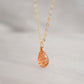 Orange Sunstone smooth polished teardrop pendant on a 14k gold filled chain. Stones shimmer in the light and when turned from side to side. 