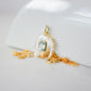 Handmade Maris necklace featuring a Blue Topaz set inside a clear Rock Crystal frame on a 14K Gold Filled chain. Ideal gift for wife, girlfriend, or mom. Minimalist topaz pendant for layering. Also a November birthstone.