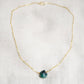 raw green amethyst gemstone on gold chain, necklace