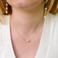 Single round white freshwater pearl necklace on a 14k gold filled chain.