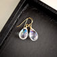 Rainbow colored mystic topaz earrings in 14k gold filled. The stone is a teardrop shape and shifts different rainbow colors..