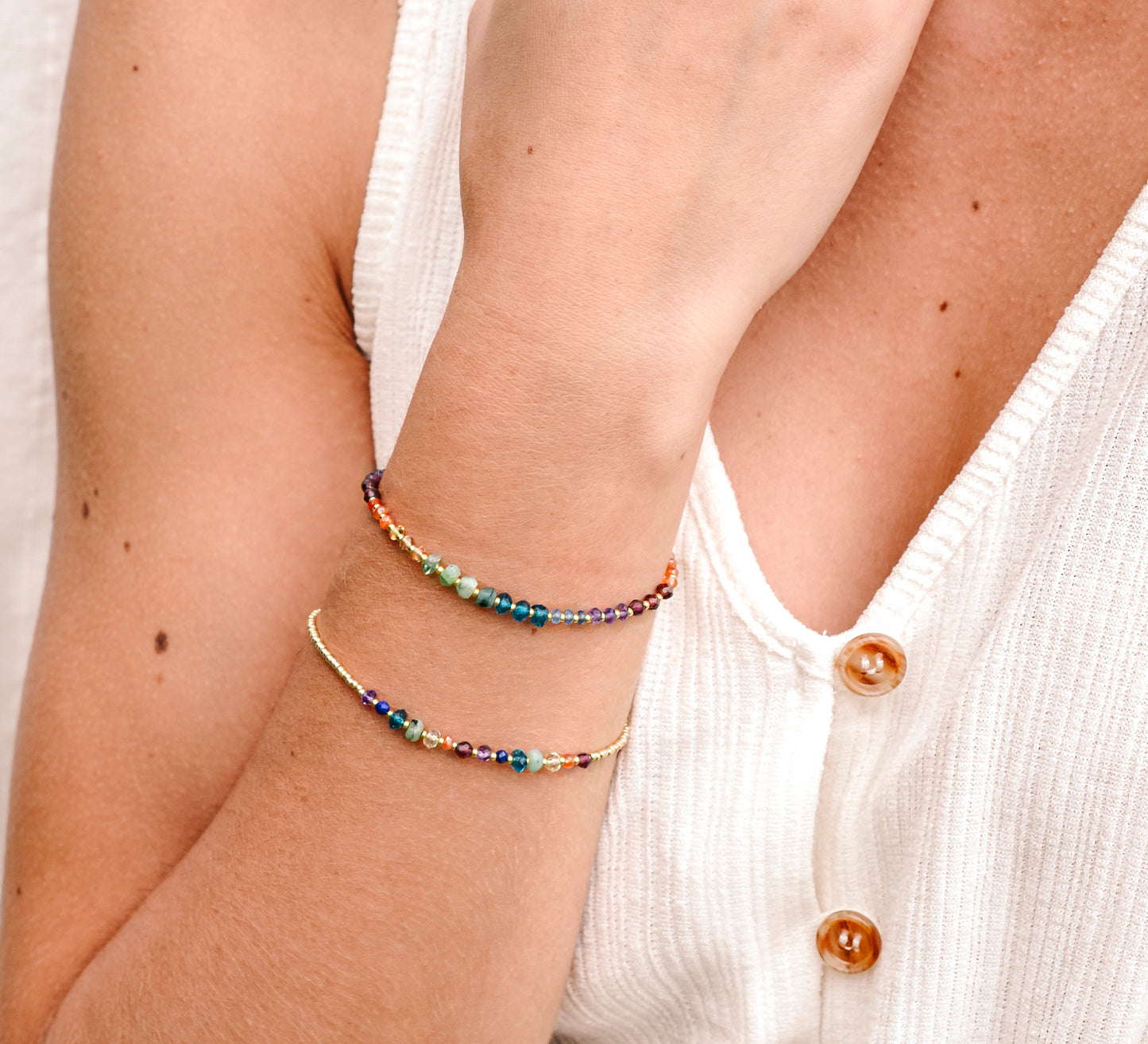 Handmade real gemstone bracelet for the Chakras or Pride. Stones include: Garnet, amethyst, topaz, emerald, carnelian, CZ, and tanzanite.